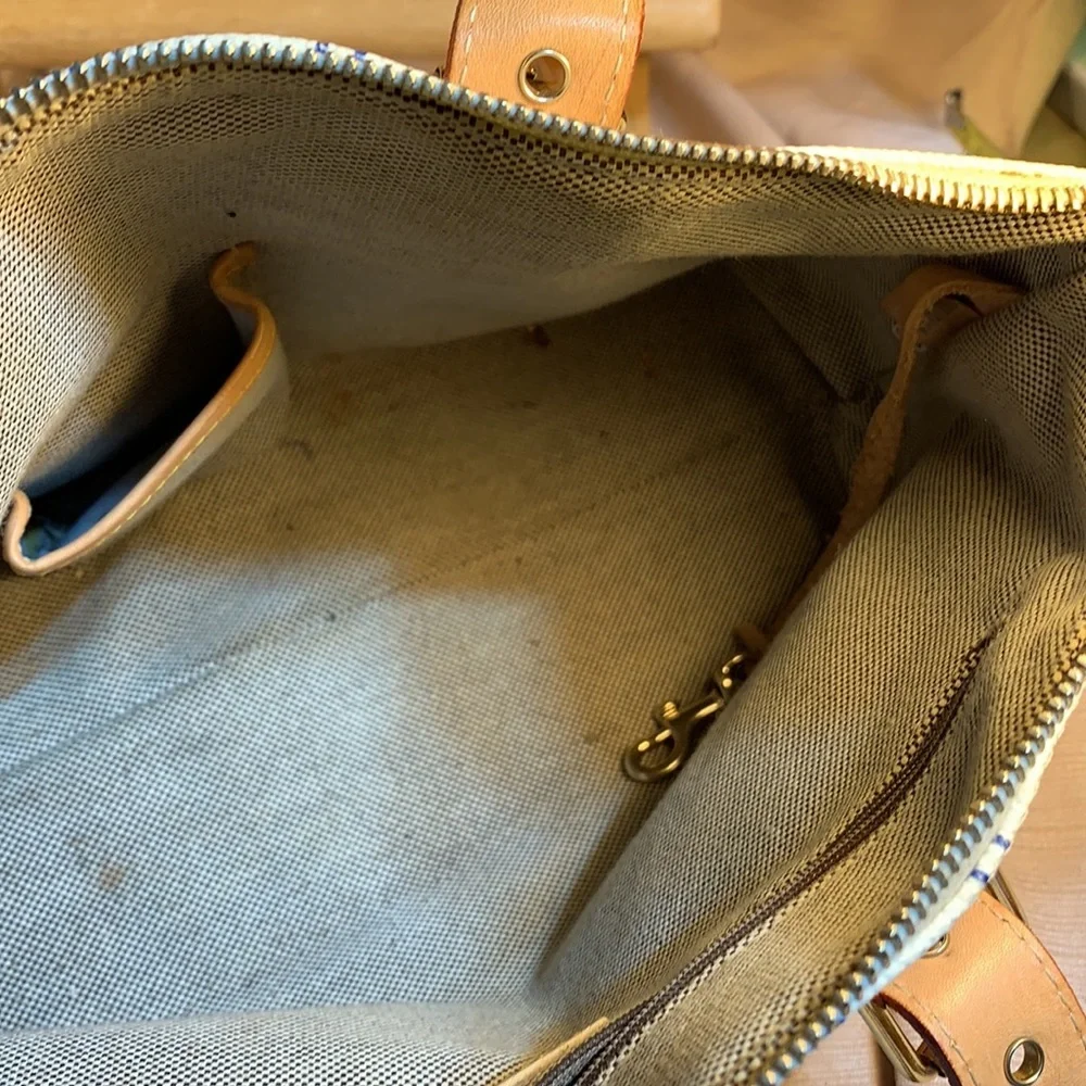 Dooney & Bourke leather satchel w/logo pattern
